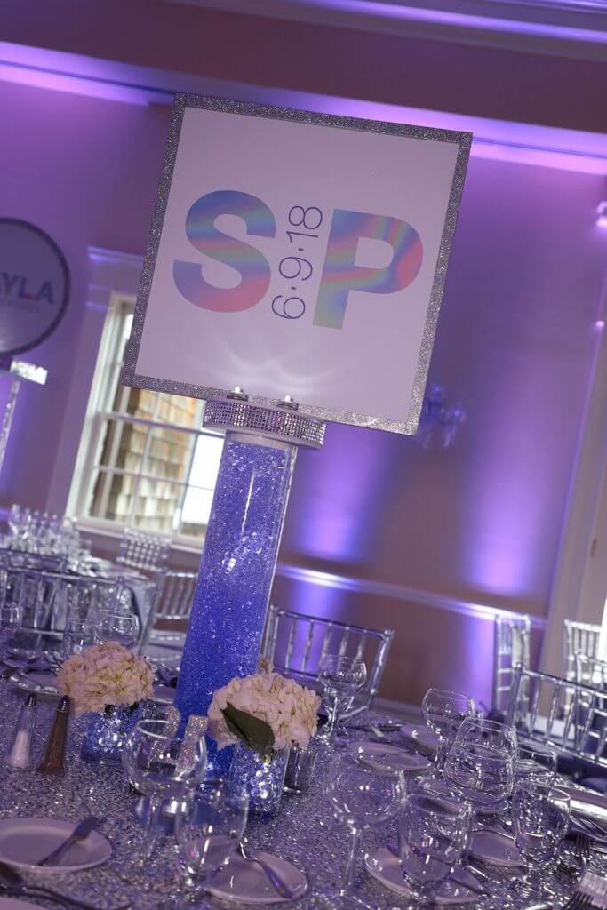 Holographic Logo Centerpiece with Glittered Border and Aqua Gems Base