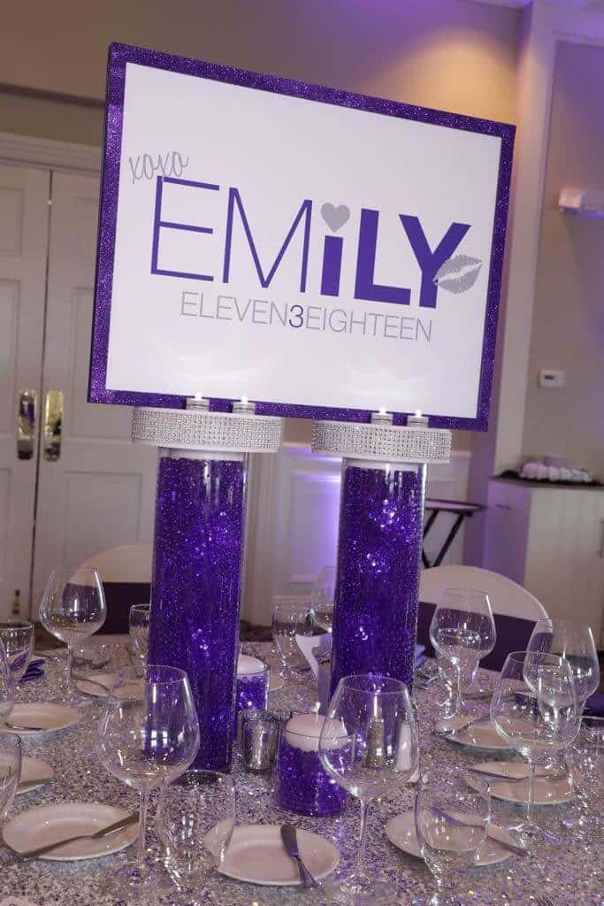 Custom Logo Centerpiece with Glittered Border and LED Aqua Gems Cylinders for Purple Themed Bat Mitzvah
