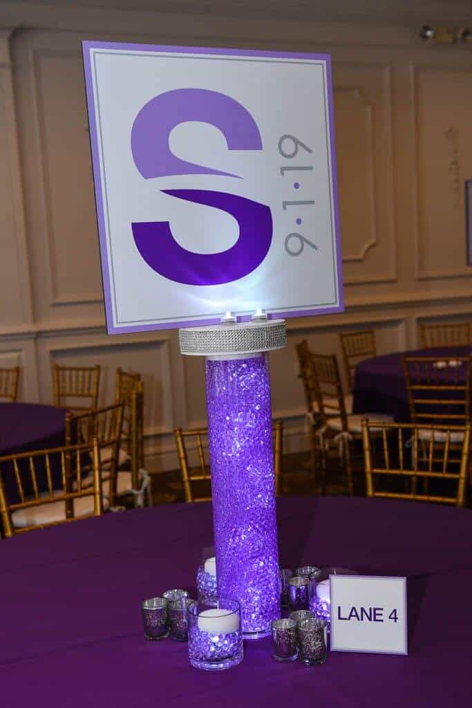 Swim Themed Logo Centerpiece on LED Cylinder with Gems