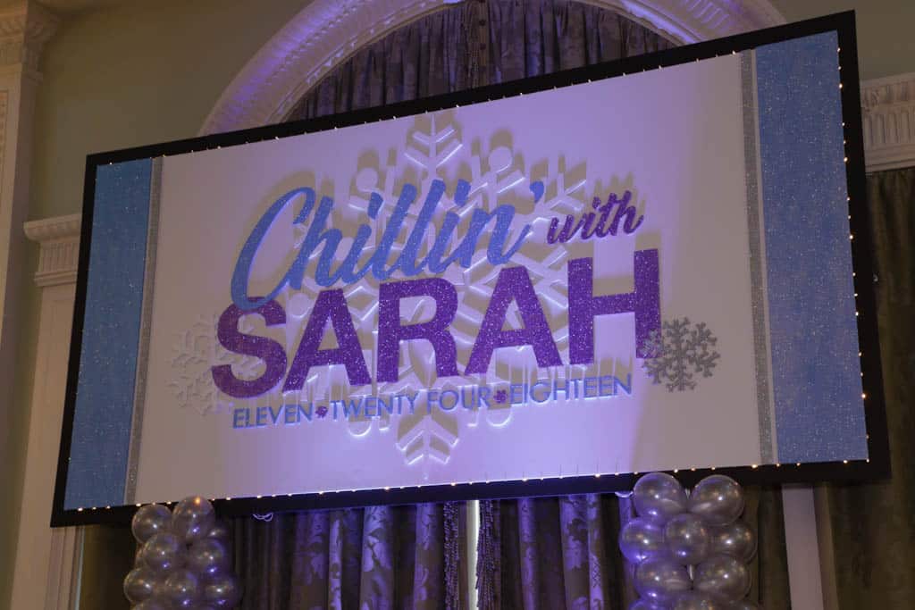 Winter Themed Backdrop with Custom Logo and Lights