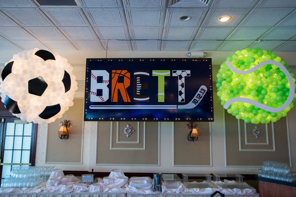 Sports Themed Backdrop with Soccer and Tennis Ball Balloon Sculptures