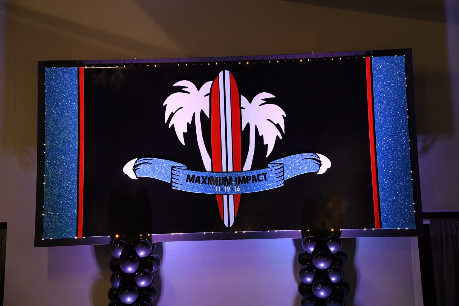 Surf Themed Backdrop with Custom Logo and Lights