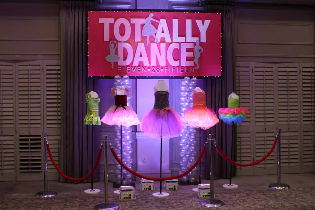 Dance Themed Bat Mitzvah with Custom Logo Backdrop and Costume Display