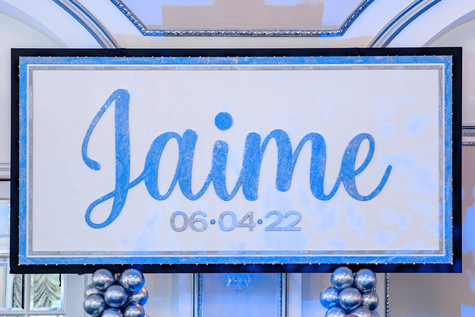 Light Blue Glittered Backdrop with Lights