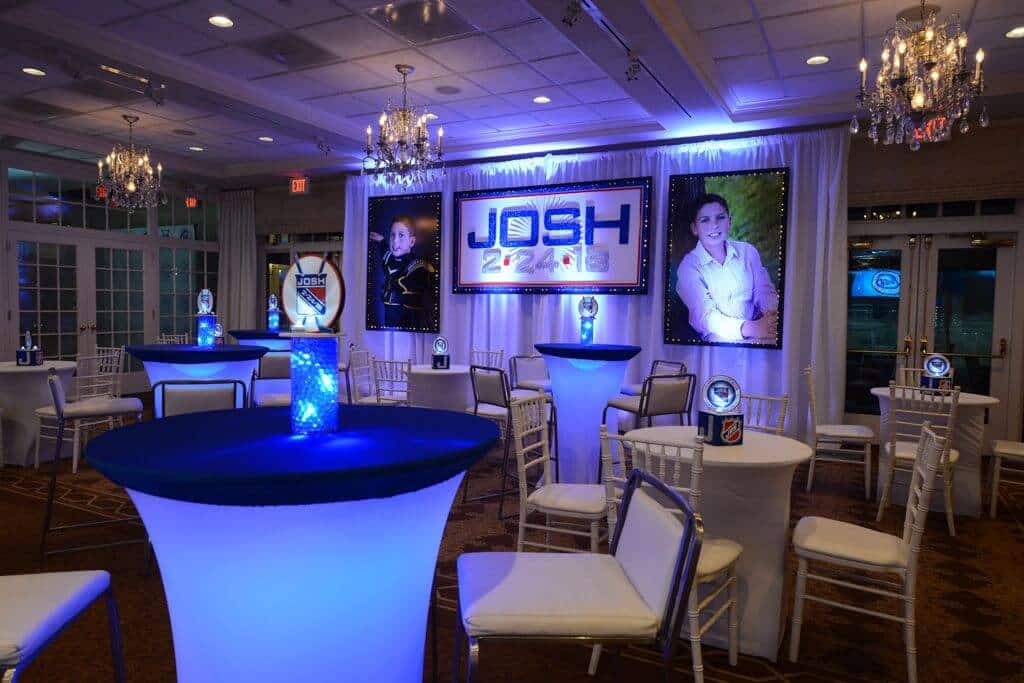 Hockey Themed Backdrop with Custom Logo and Blowup Photos at Preakness Hills CC