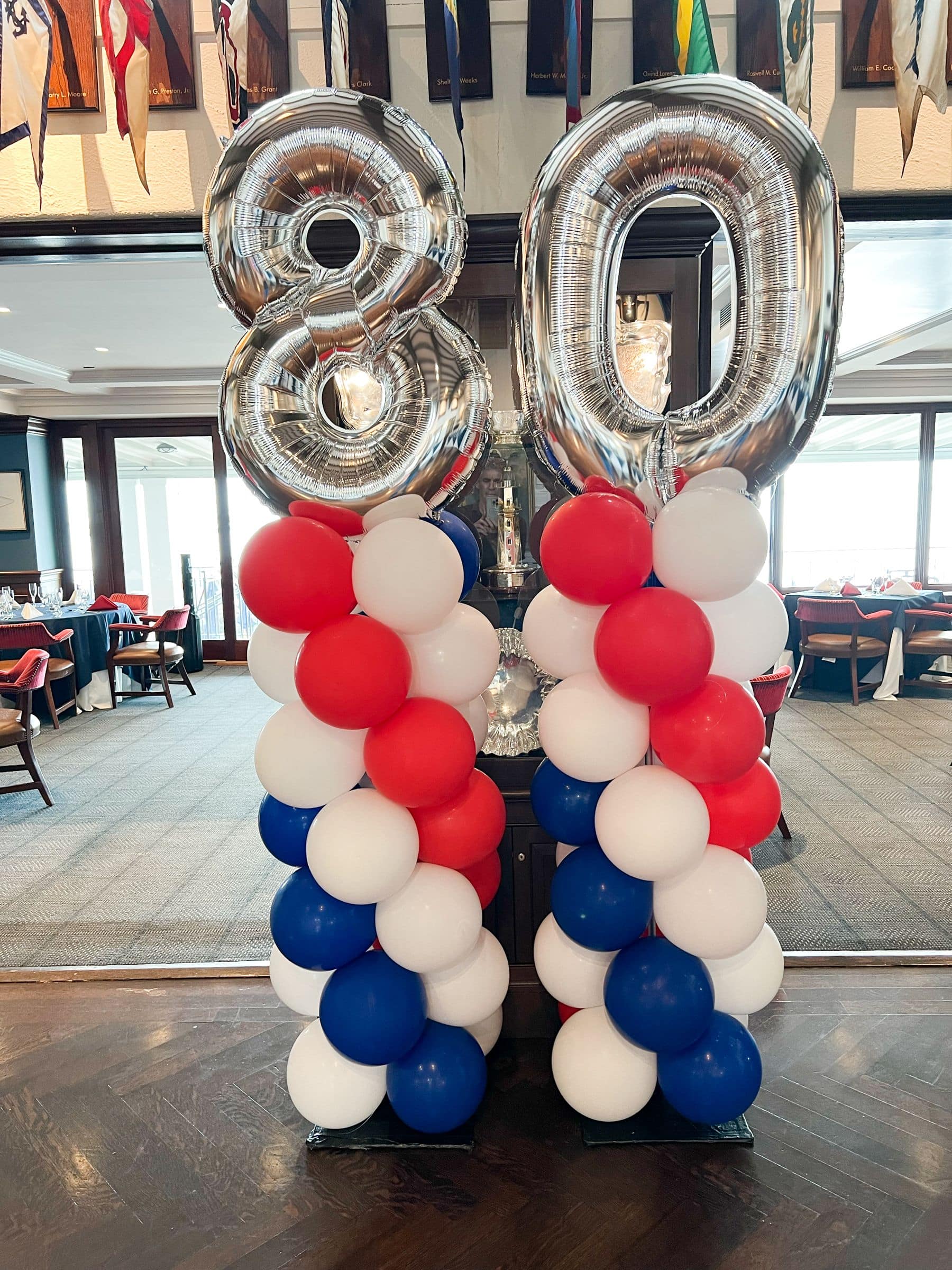 Red, White and Blue Balloon Columns with Silver Number Topper