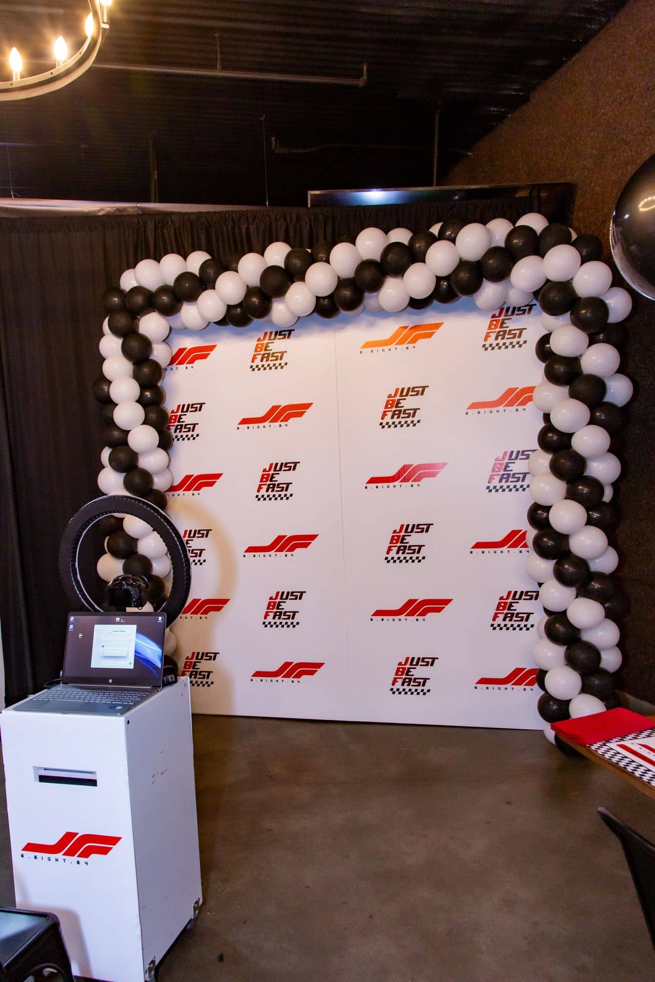 Black and White Balloon Arch for Racing Themed Bar Mitzvah Photo Booth