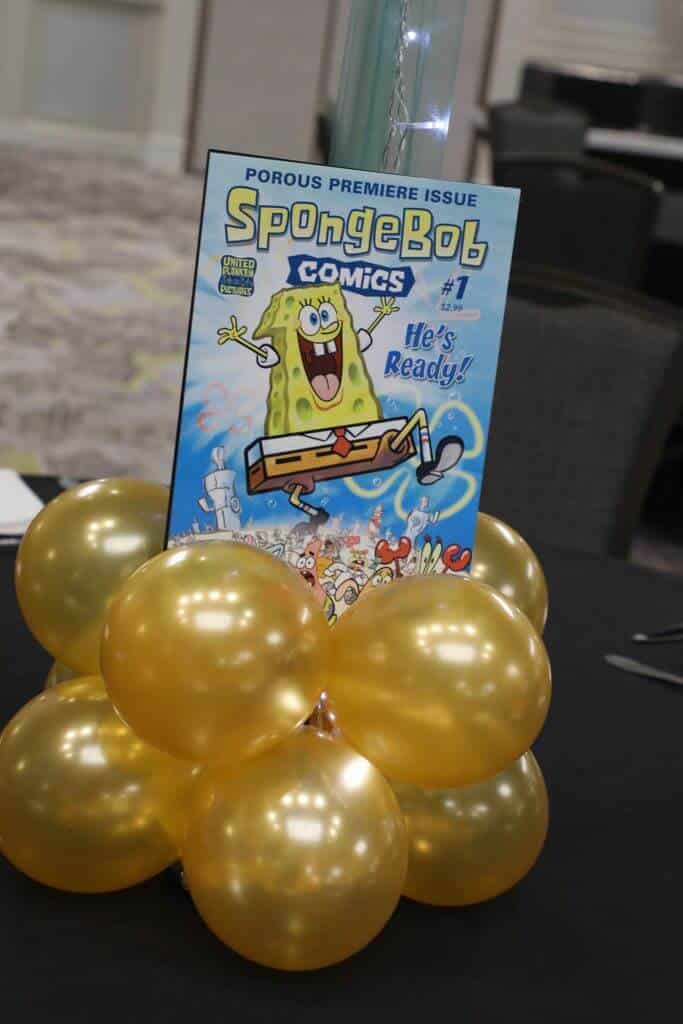 Cutout Book Sign in Balloon Centerpiece Base