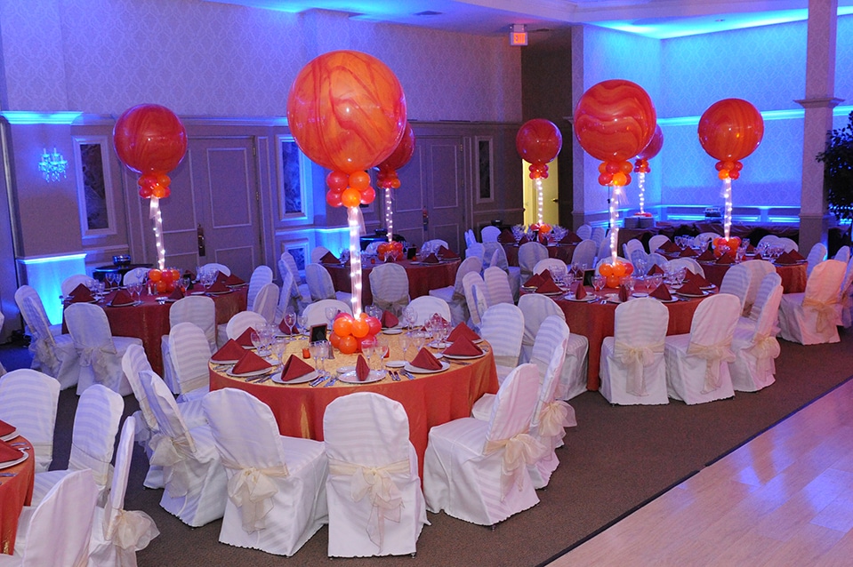 Red and Orange Marble Balloon Centerpieces with Tulle and Lights