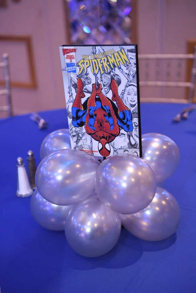 Comic Themed Balloon Centerpiece with Book Cover in Base and Floating Character Cutout