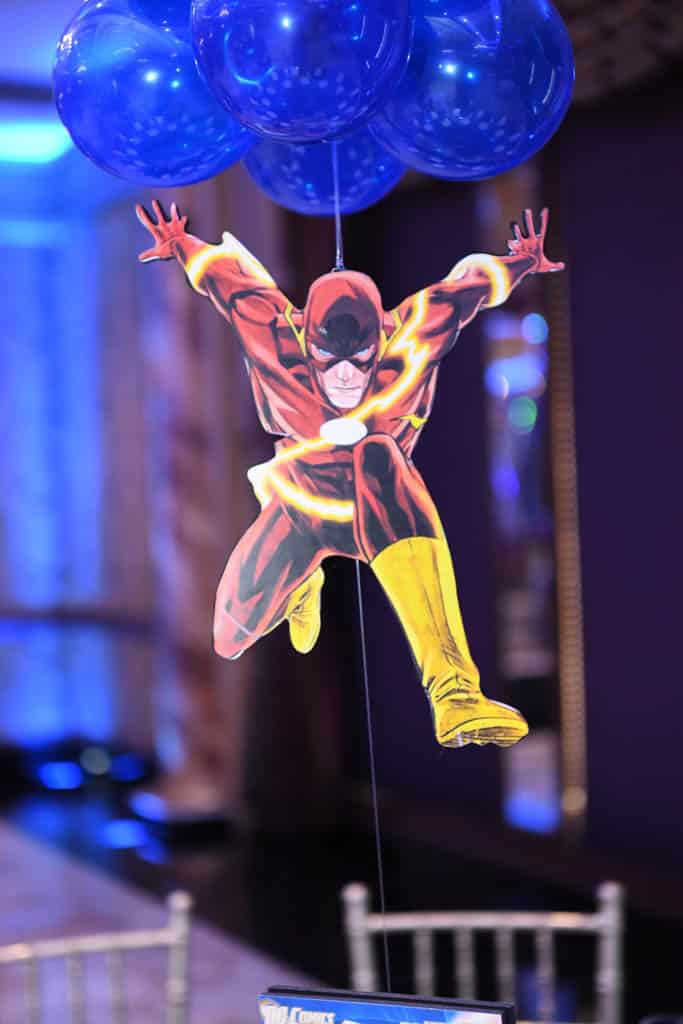 Comic Themed Balloon Centerpiece with Book Cover in Base and Floating Character Cutout