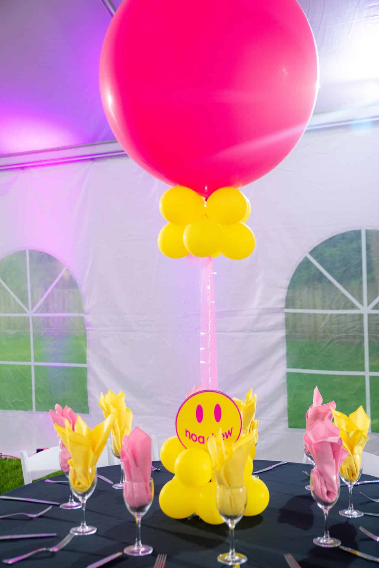 Hot Pink and Yellow Balloon Centerpiece with Balloon Base and Logo Cutout
