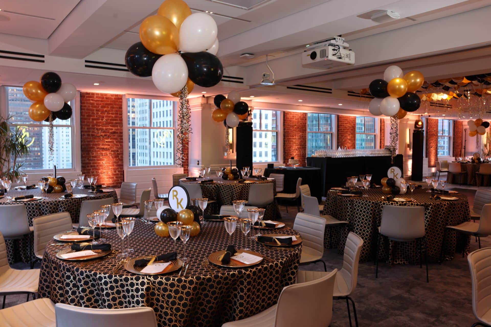 Balloon Topiary Centerpieces with Balloon Base and Logo Cutout for Graduation Party at Studio Gather, NYC