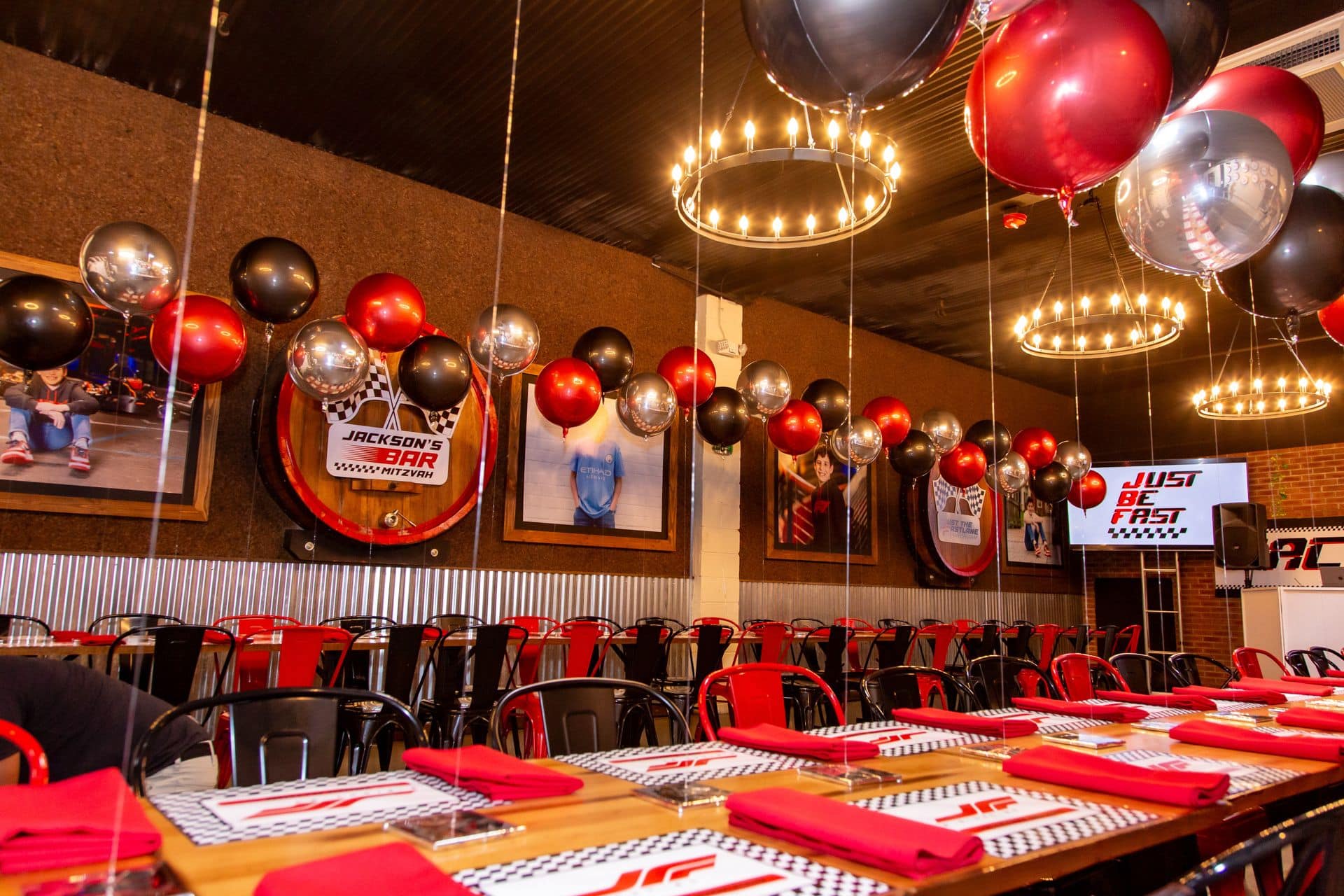 Metallic Orbs Balloon Scape Over Table for a Race Car Themed Bar Mitzvah