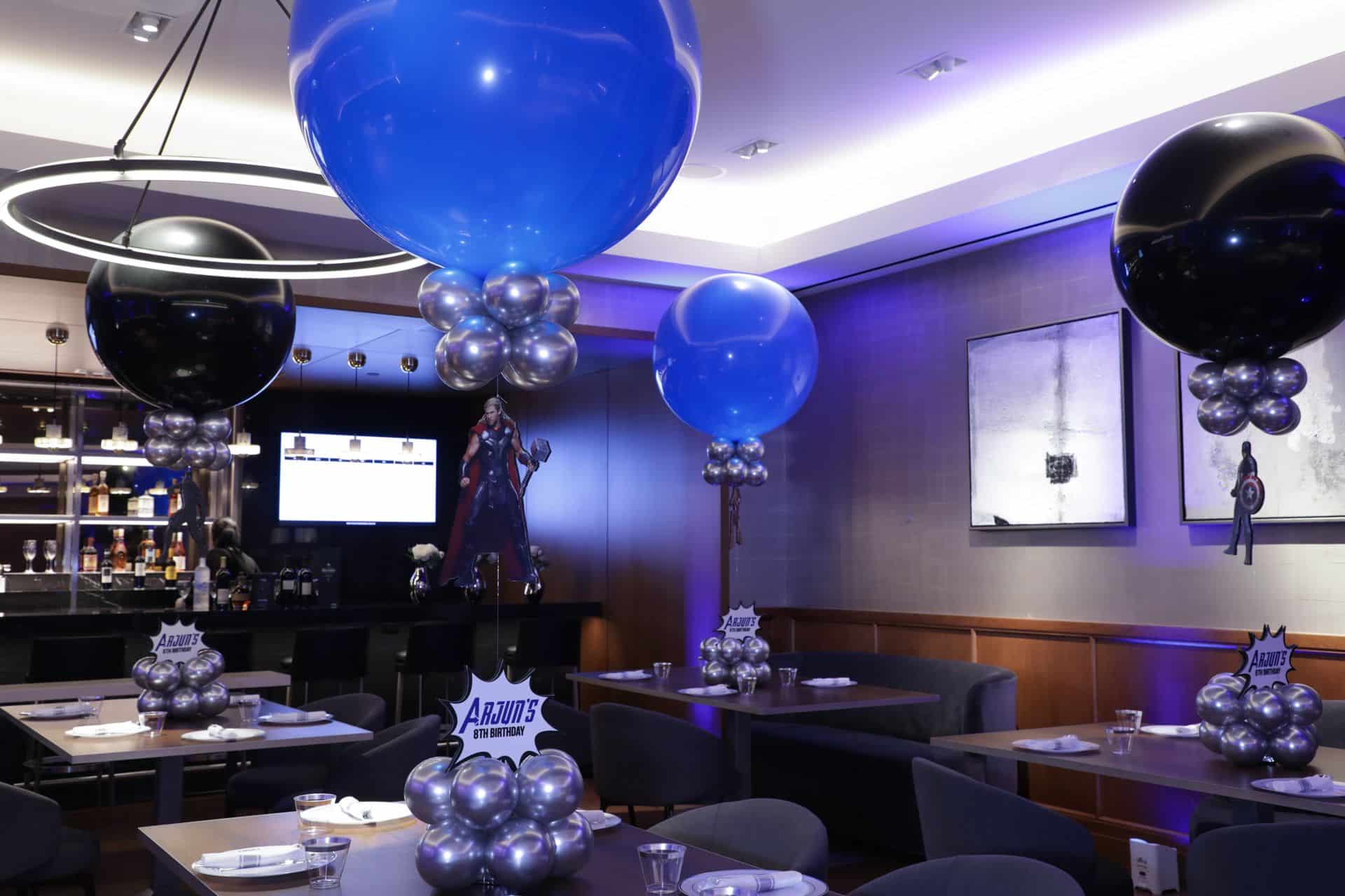 Superhero Themed Balloon Centerpiece with Custom Logo Base and Thor Cutout