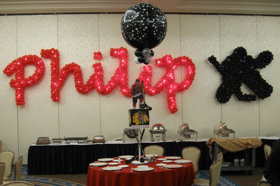 Hockey Silhouette Balloon Sculpture and Name in Balloons
