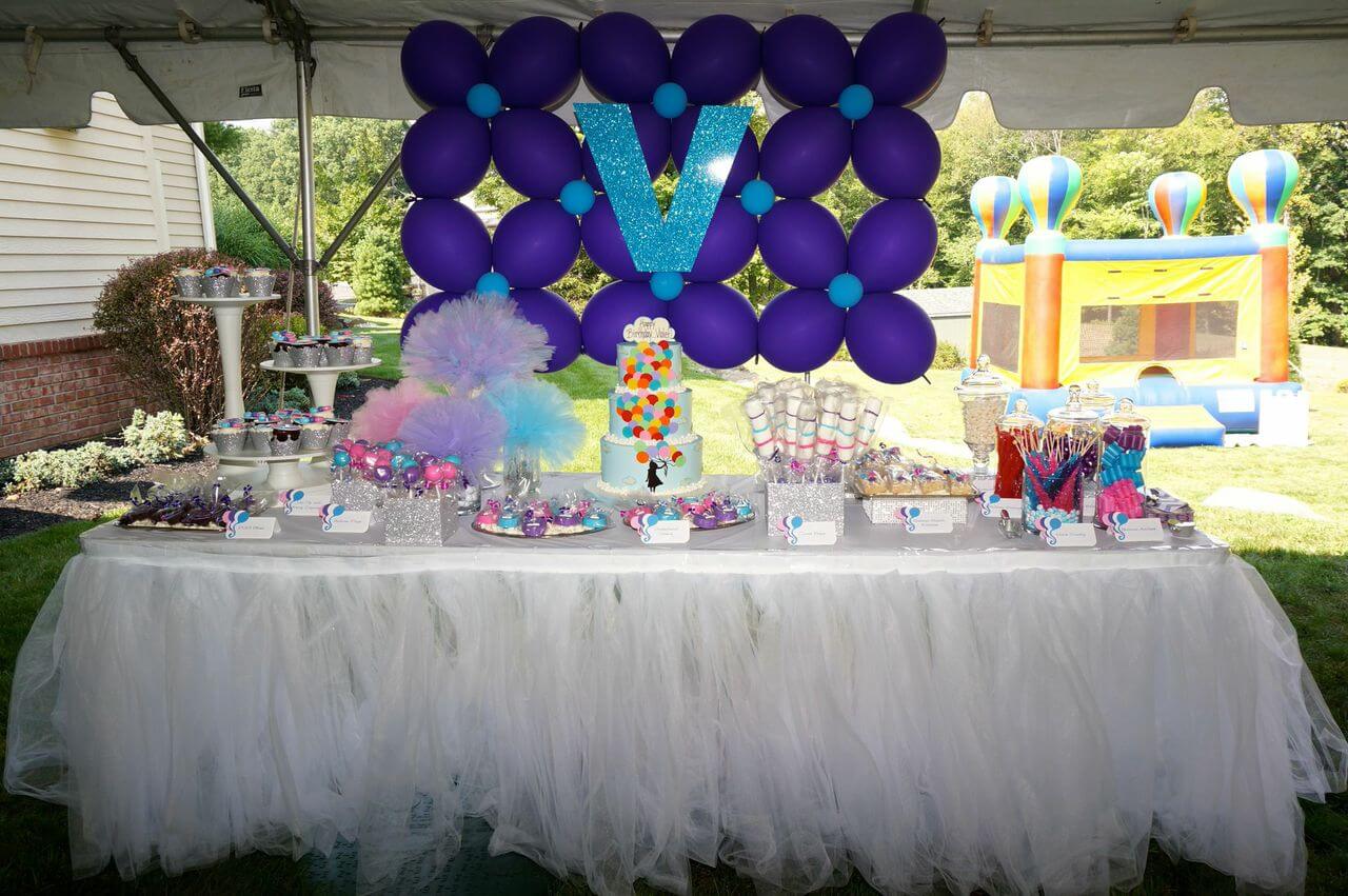 Custom Balloon Wall with Sparkly Initial Behind Candy Bar Display