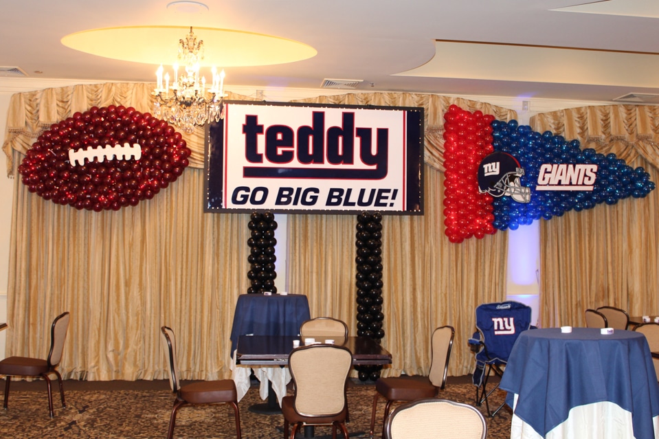 Custom Giants Themed Backdrop with Football and Giants Pennant Balloon Sculptures