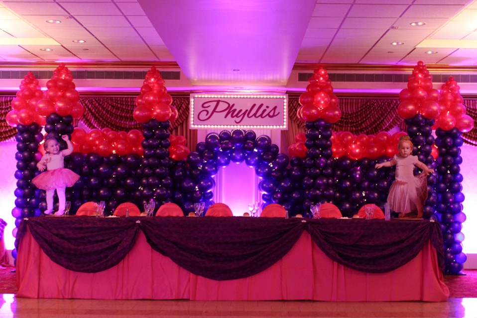 Pink and Purple Princess Balloon Castle with Uplighting