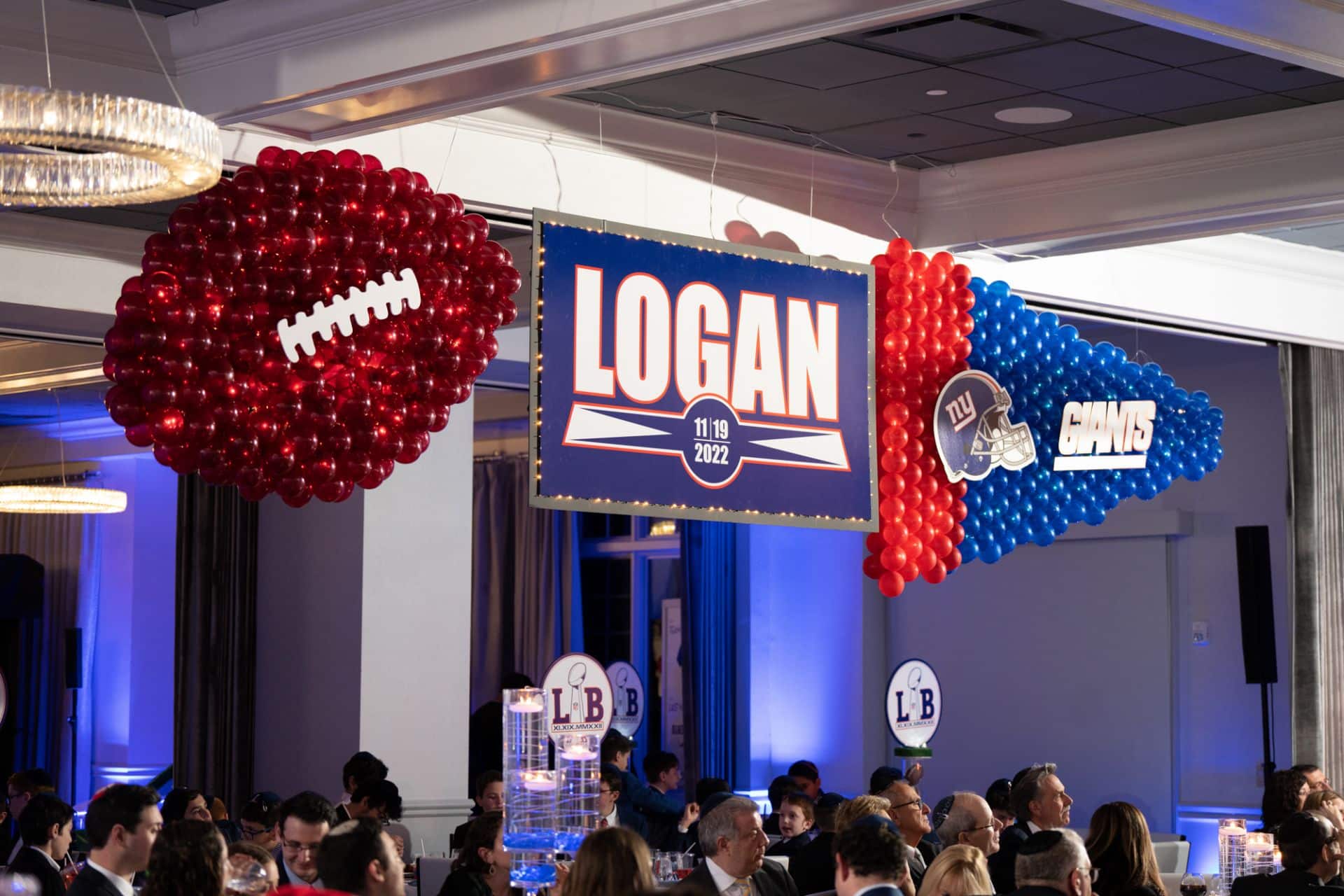Football Themed Balloon Football and Pennant Sculptures with Custom Logo Backdrop for Bar Mitzvah at Alpine Country Club