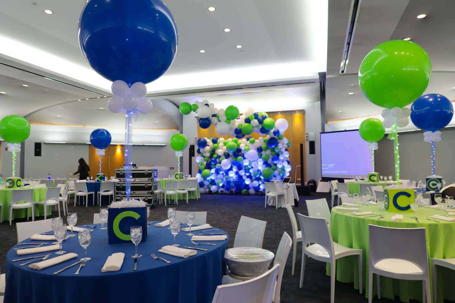 Custom Cube Centerpieces with Cutout Initial and Logo for Blue and Lime Themed Bar Mitzvah at Temple Israel, NYC