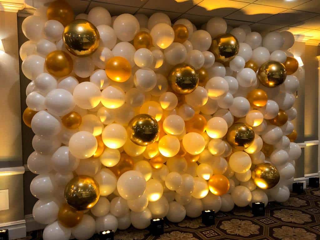 White and Gold Organic Balloon Wall with Metallic Orbz and LED Lighting for Sweet Sixteen Photo Booth