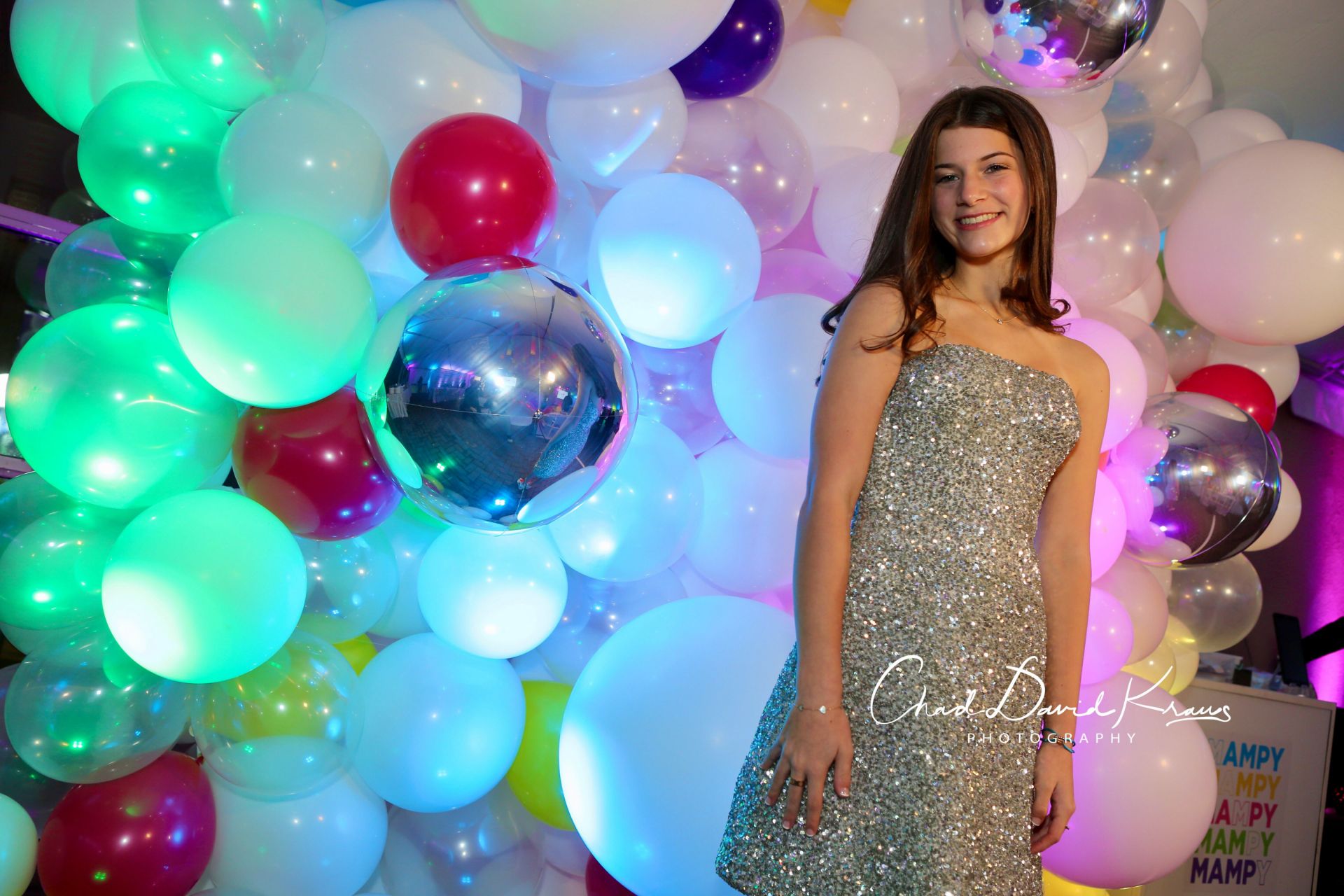 Beautiful White and Clear Balloon Wall with Pink, Purple and Yellow Accents and Metallic Silver Orbz for Outdoor Party Decor