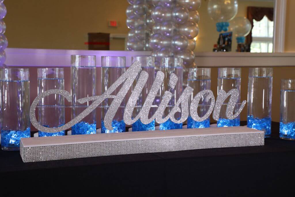 LED Candle Lighting Display with Custom Glittered Name and Cylinders with Floating Candles