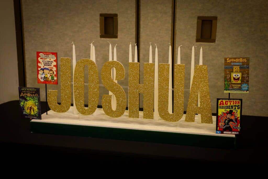 Book Themed Candle Lighting Display with Name and Book Cutouts