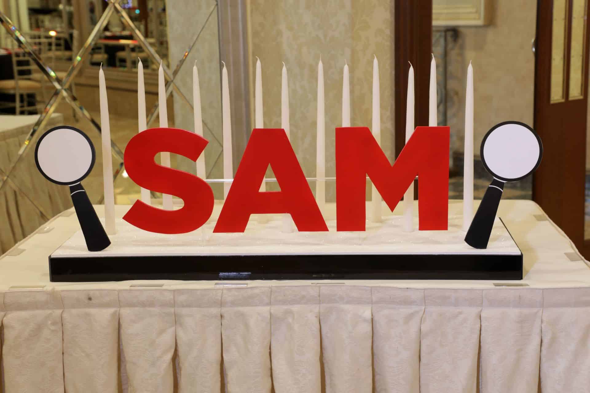 Clue Themed Candle Lighting Display with Magnifying Glass Cutouts