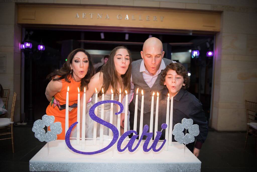 Bat Mitzvah Candle Lighting Centerpiece with Glittered Name and Flowers