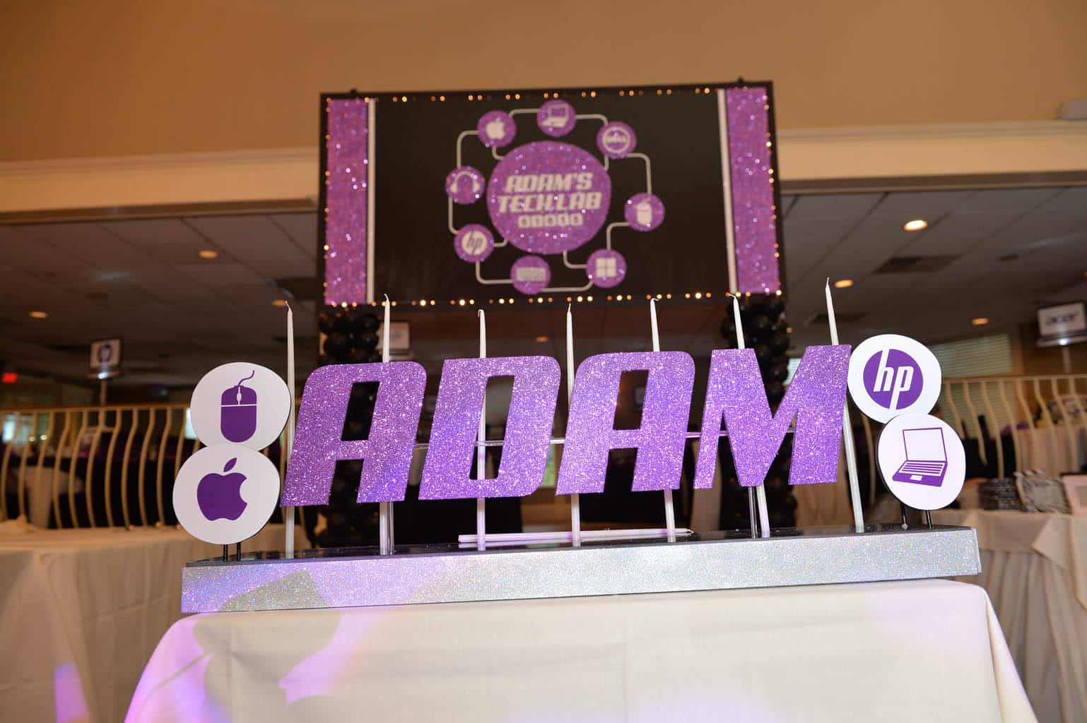 Technology Themed Candle Lighting Display with Cutout Name and Computer Graphics