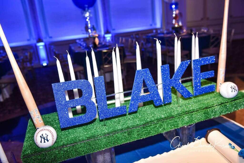 Baseball Themed Candle Lighting Display with Bats and Balls on Turf Base