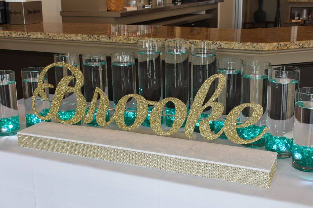 LED Candle Lighting Display with Custom Glittered Name and Cylinders with Floating Candles