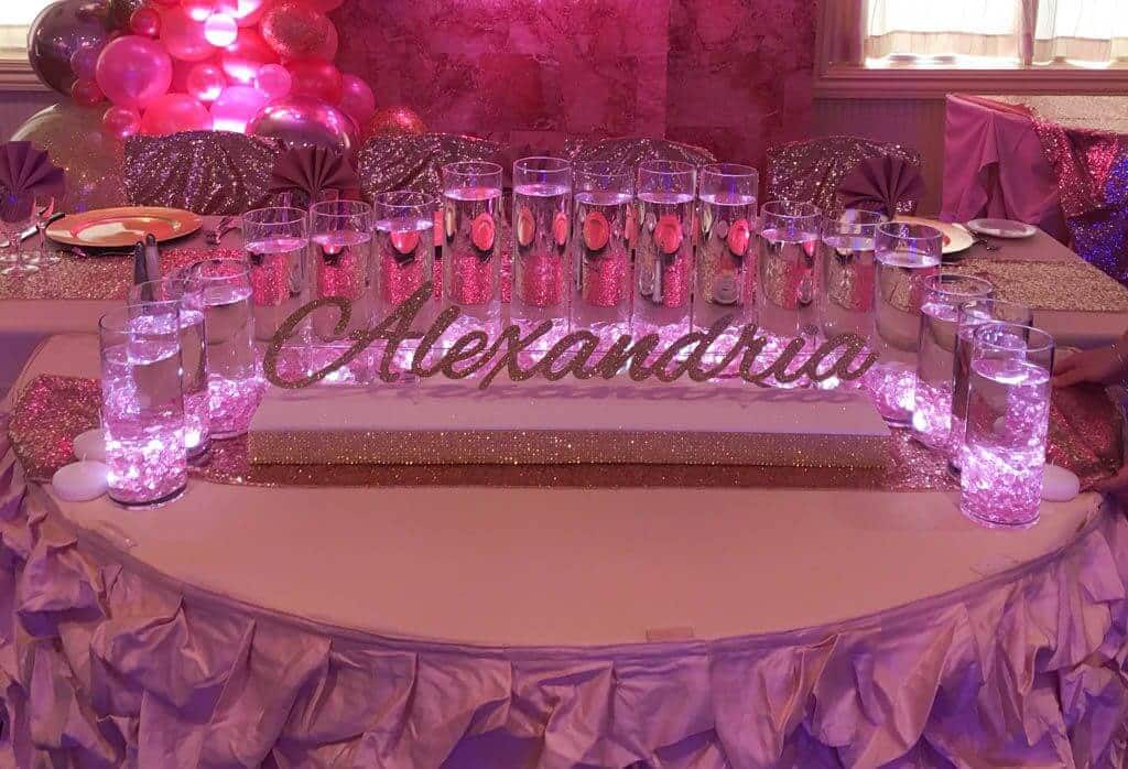 LED Candle Lighting Display with Custom Glittered Name and Cylinders with Floating Candles