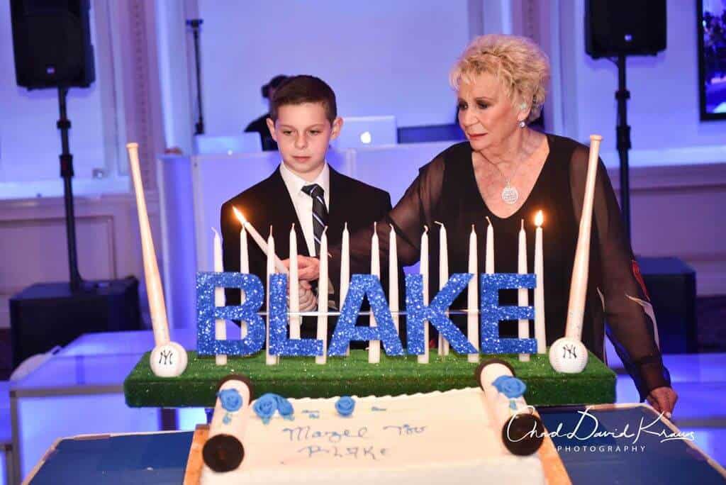 Baseball Themed Candle Lighting Display with Bats and Balls on Turf Base