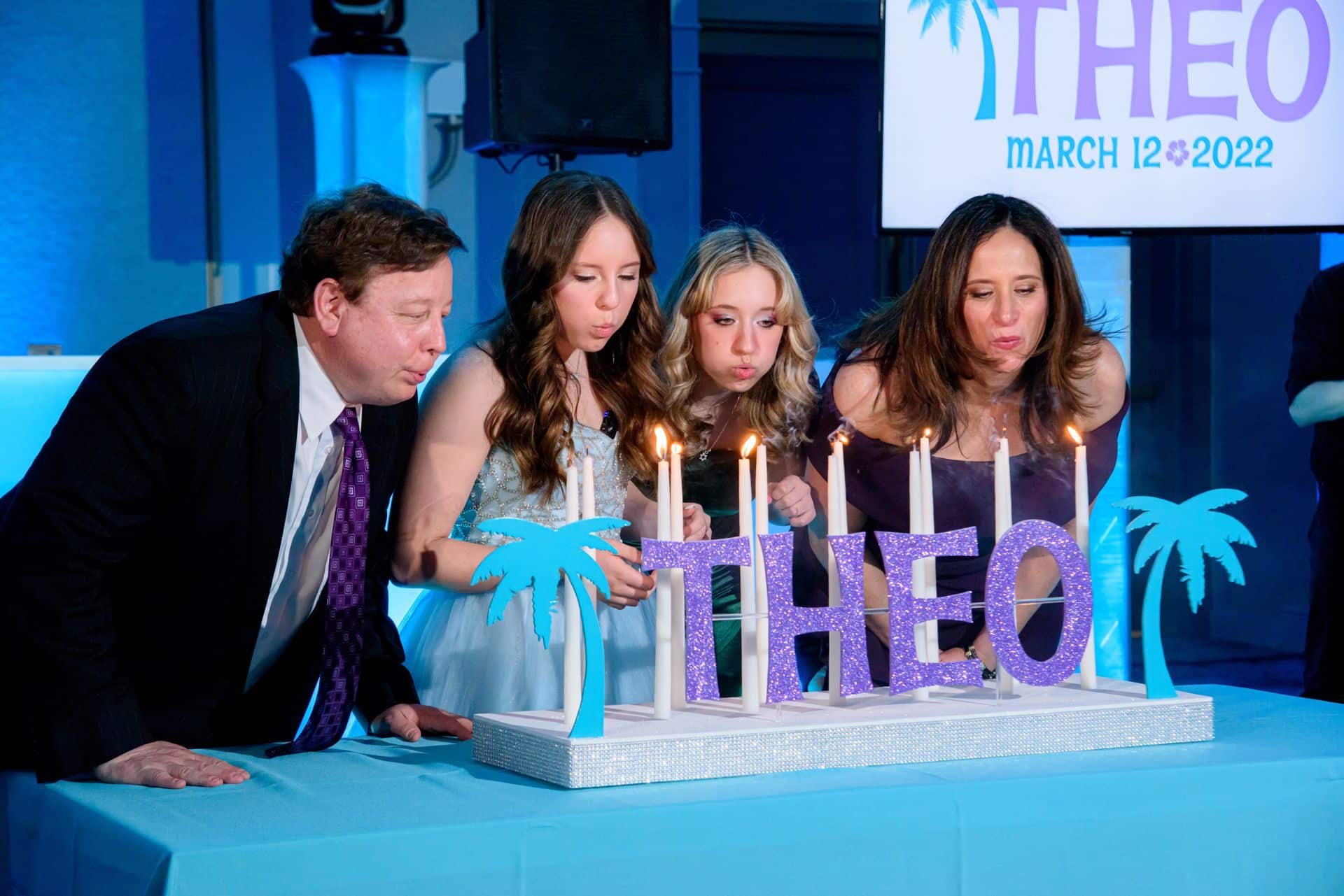 Tropical Themed Candle Lighting Display with Cutout Palm Trees