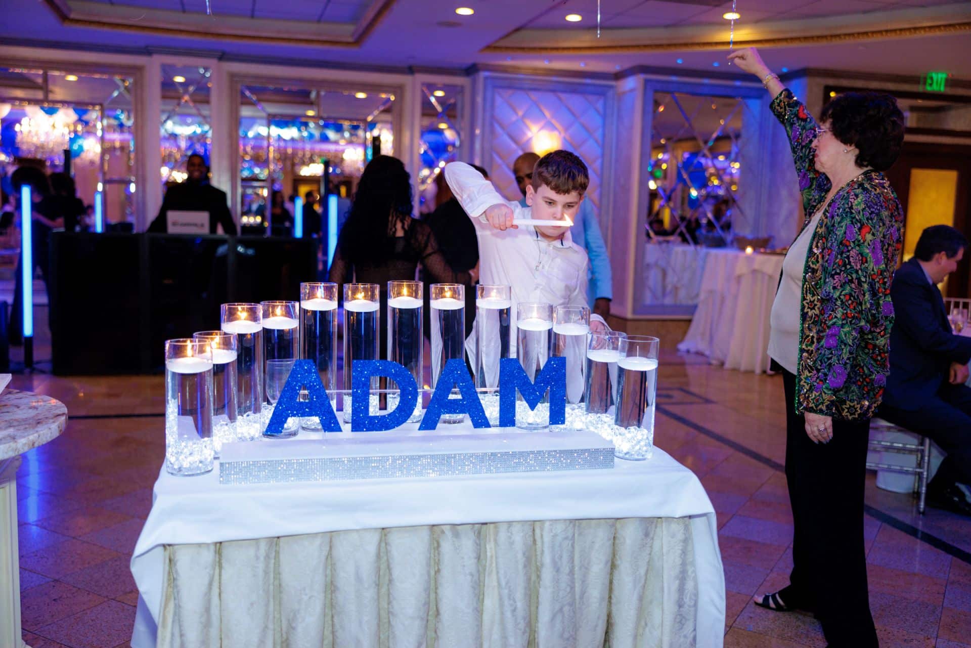 Blue Glitter Candle Lighting Display with Cylinders and Clear LED Chips