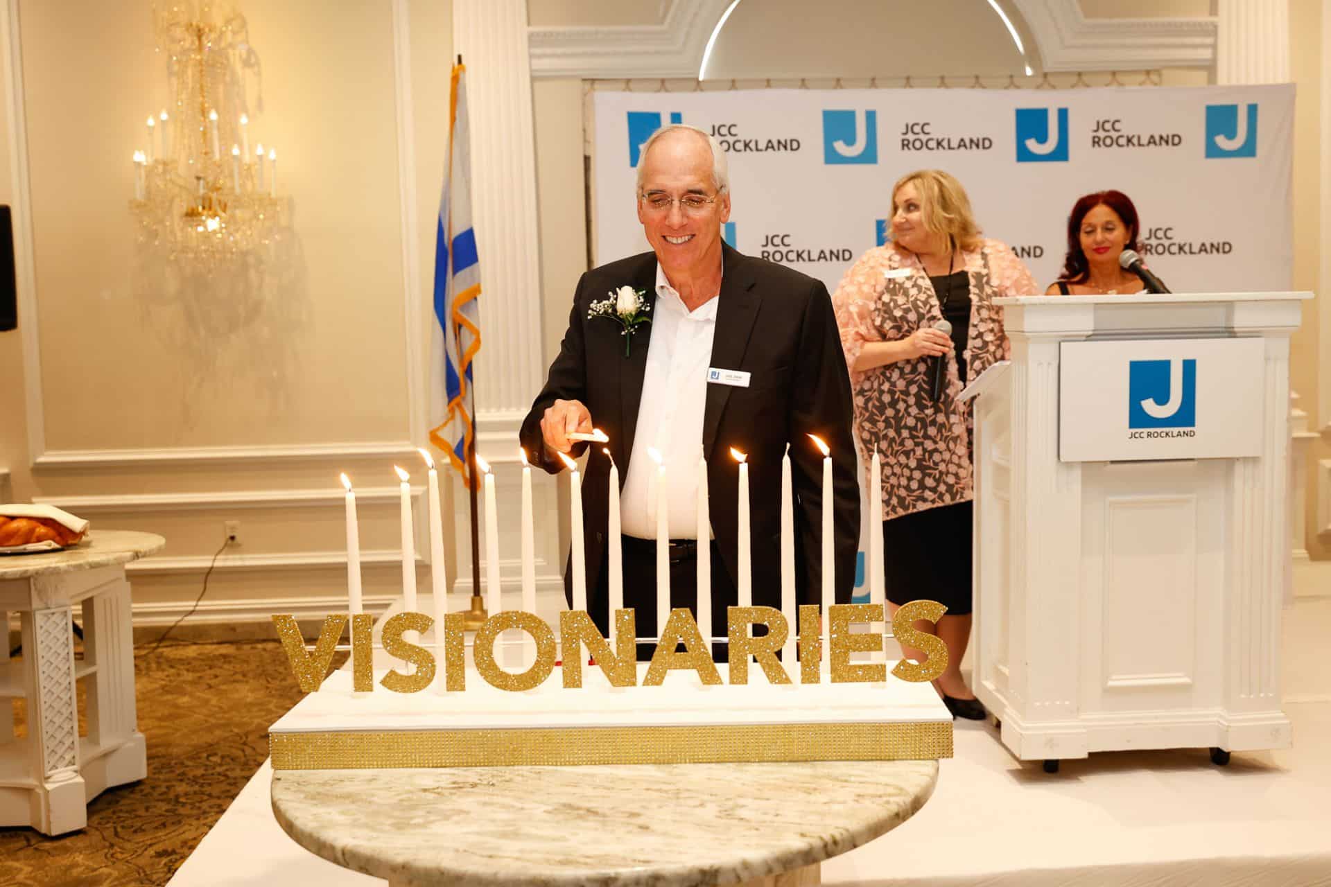 Candle Lighting Centerpiece with Gold Glitter Letters for JCC Event