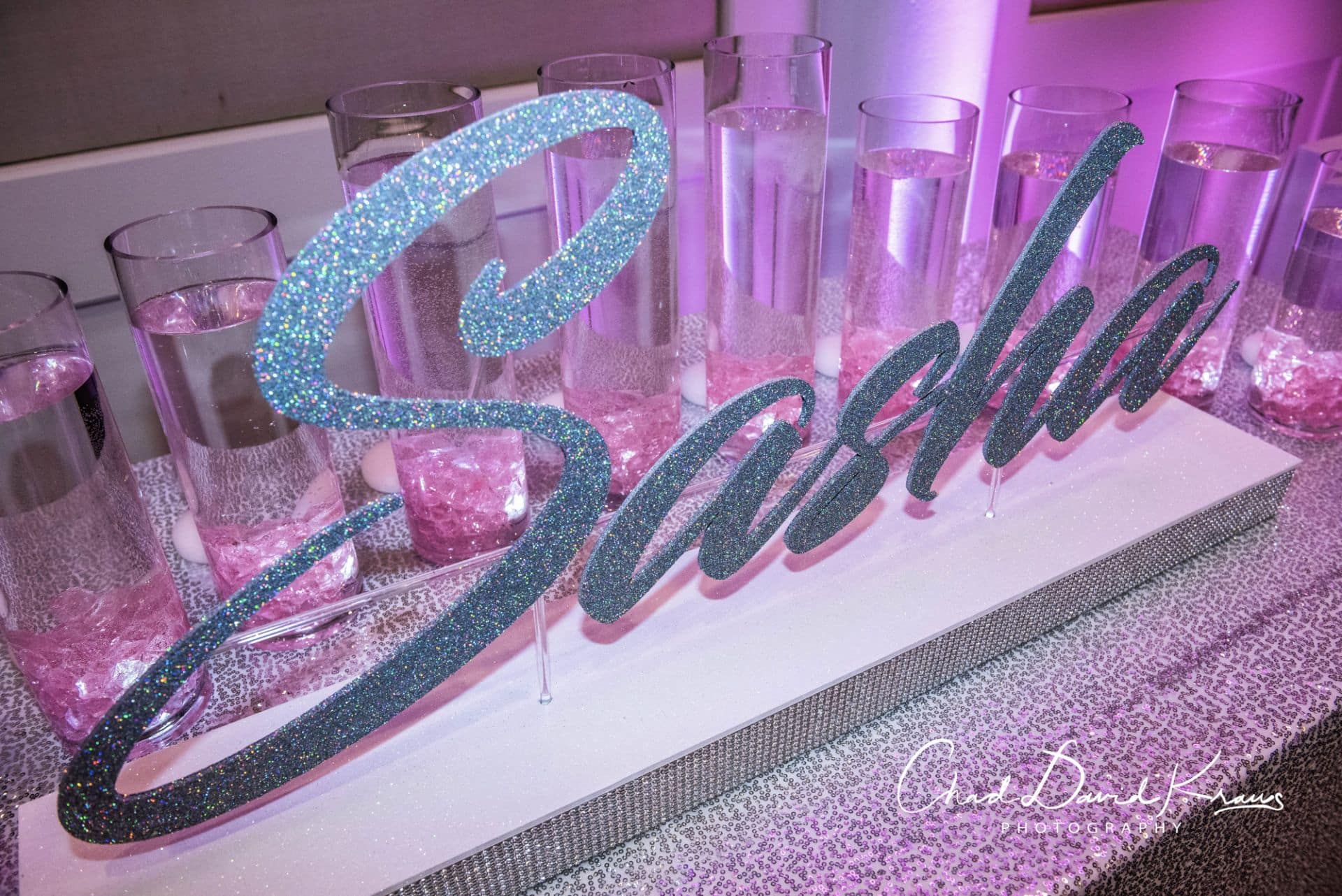 LED Candle Lighting with Silver Glitter Name and Light Pink Cylinders with Floating Candles