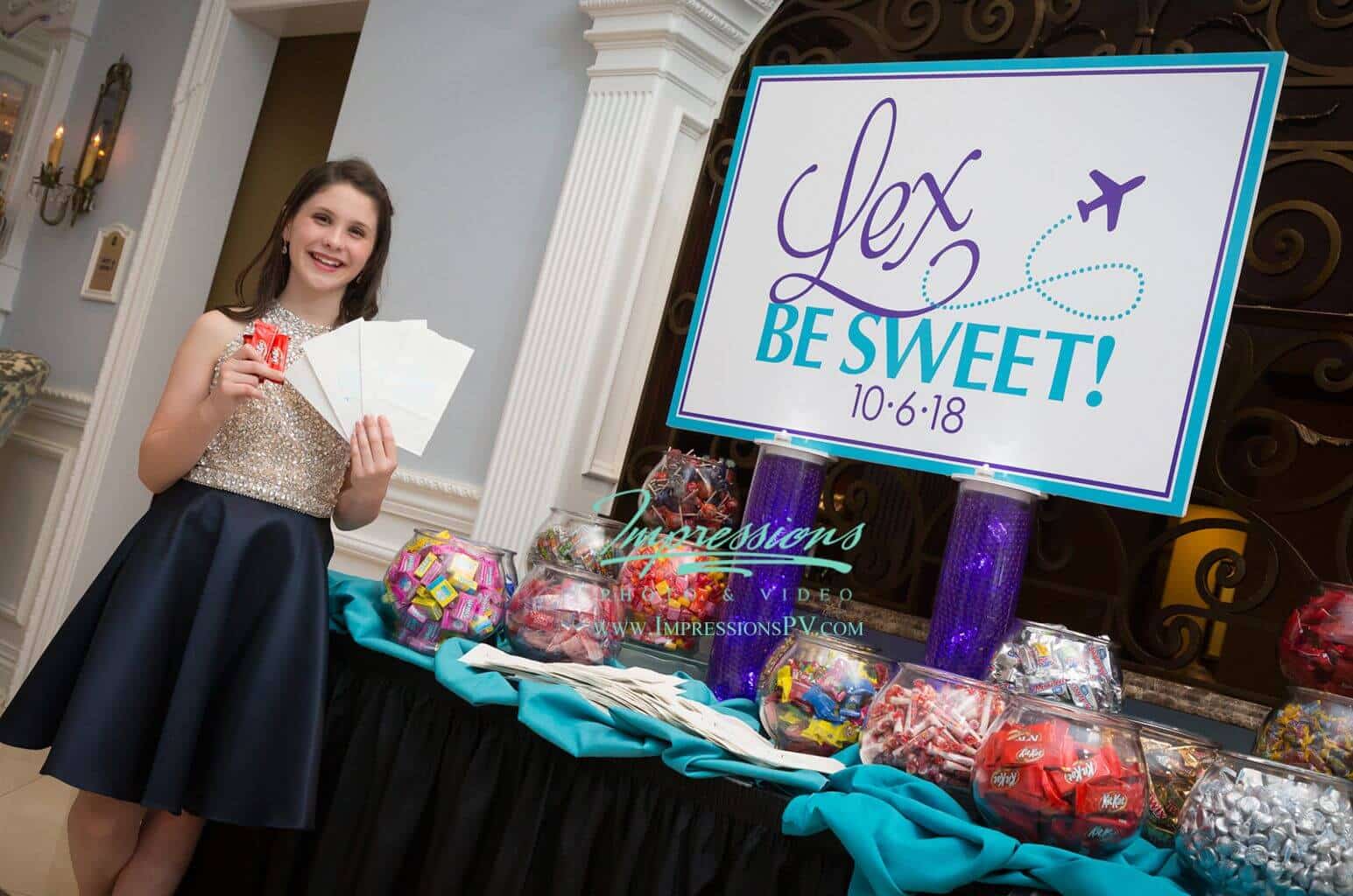 Travel Theme Bat Mitzvah Candy Bar With LED Aqua Gem Cylinders and Custom Sign