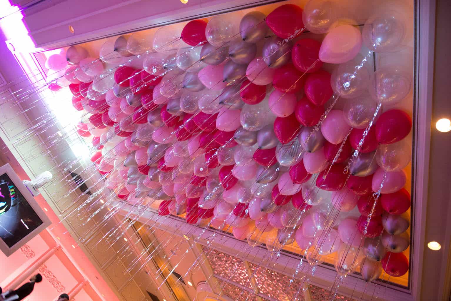 Shades of Pink Loose Balloons on Ceiling with Shimmer and Sparkle Ribbon