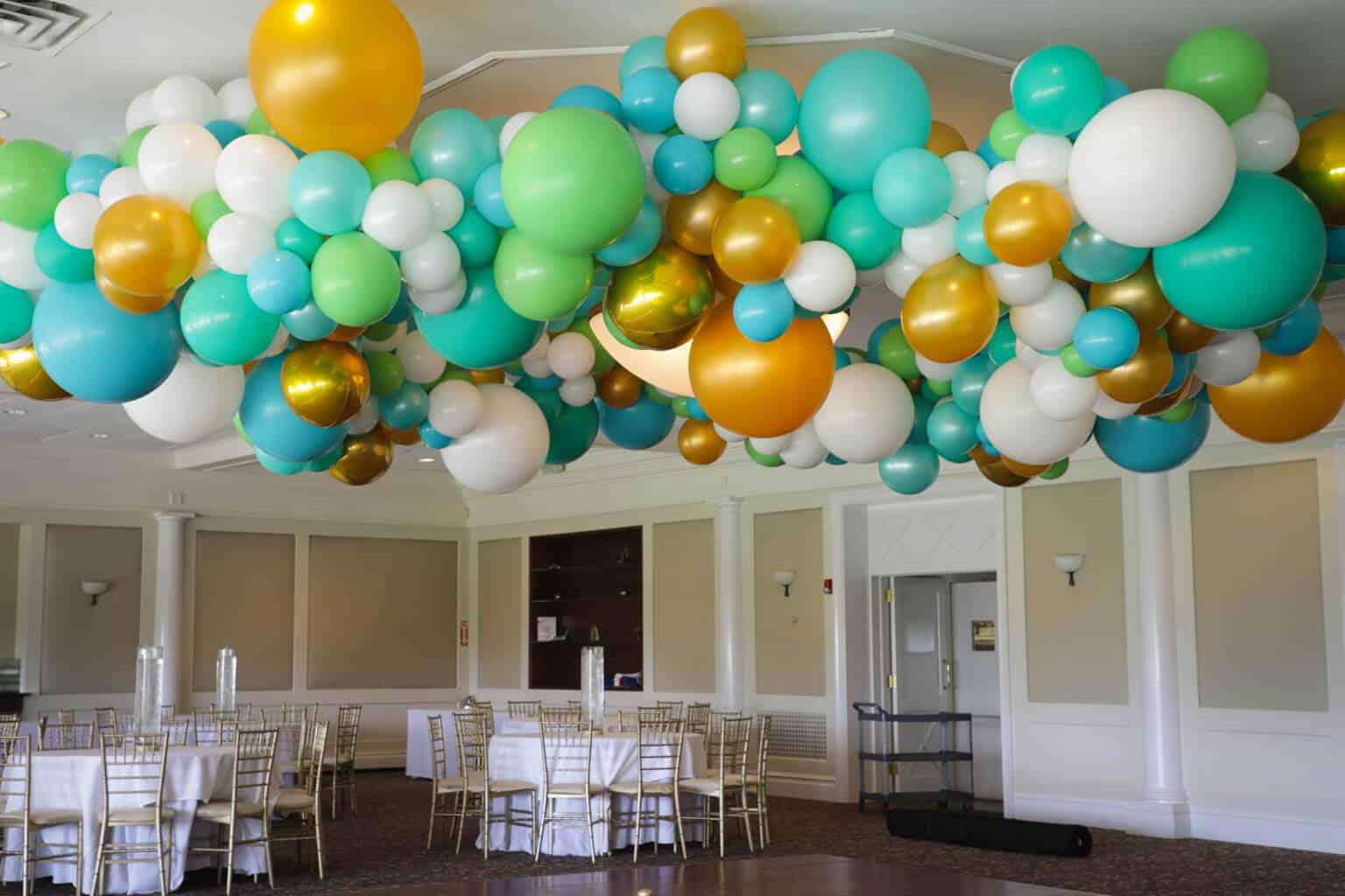 Turquoise and Gold Organic Ceiling Balloon Sculpture at Hampshire Country Club