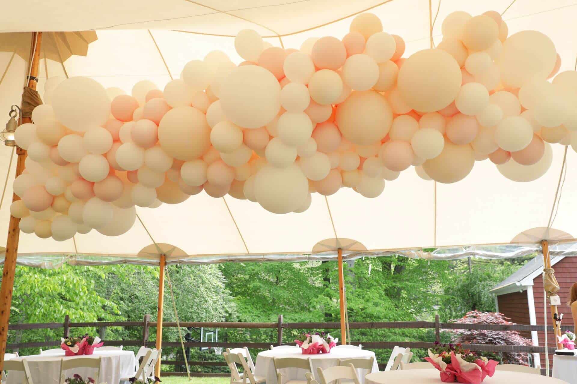 Organic Balloon Garland on Tent Ceiling For Outdoor Baby Shower Decor