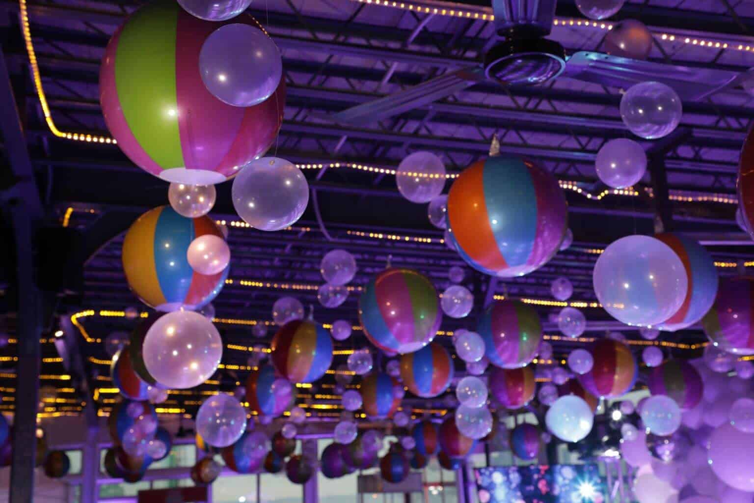 Metallic Beach Ball and Clear Bubble Balloons over Room for Beach Themed Bat Mitzvah at Sunset Terrace, NYC