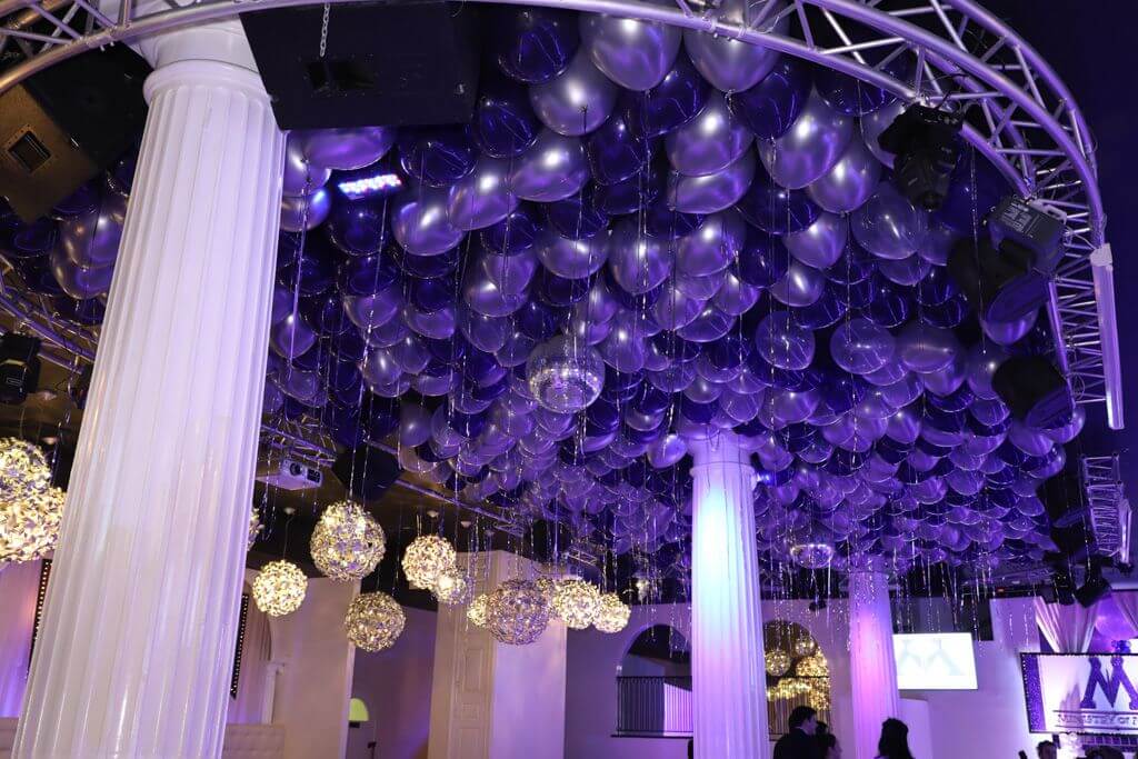 Purple and Silver Ceiling Balloons with Shimmer Ribbon over Dance Floor at The Coliseum, White Plains