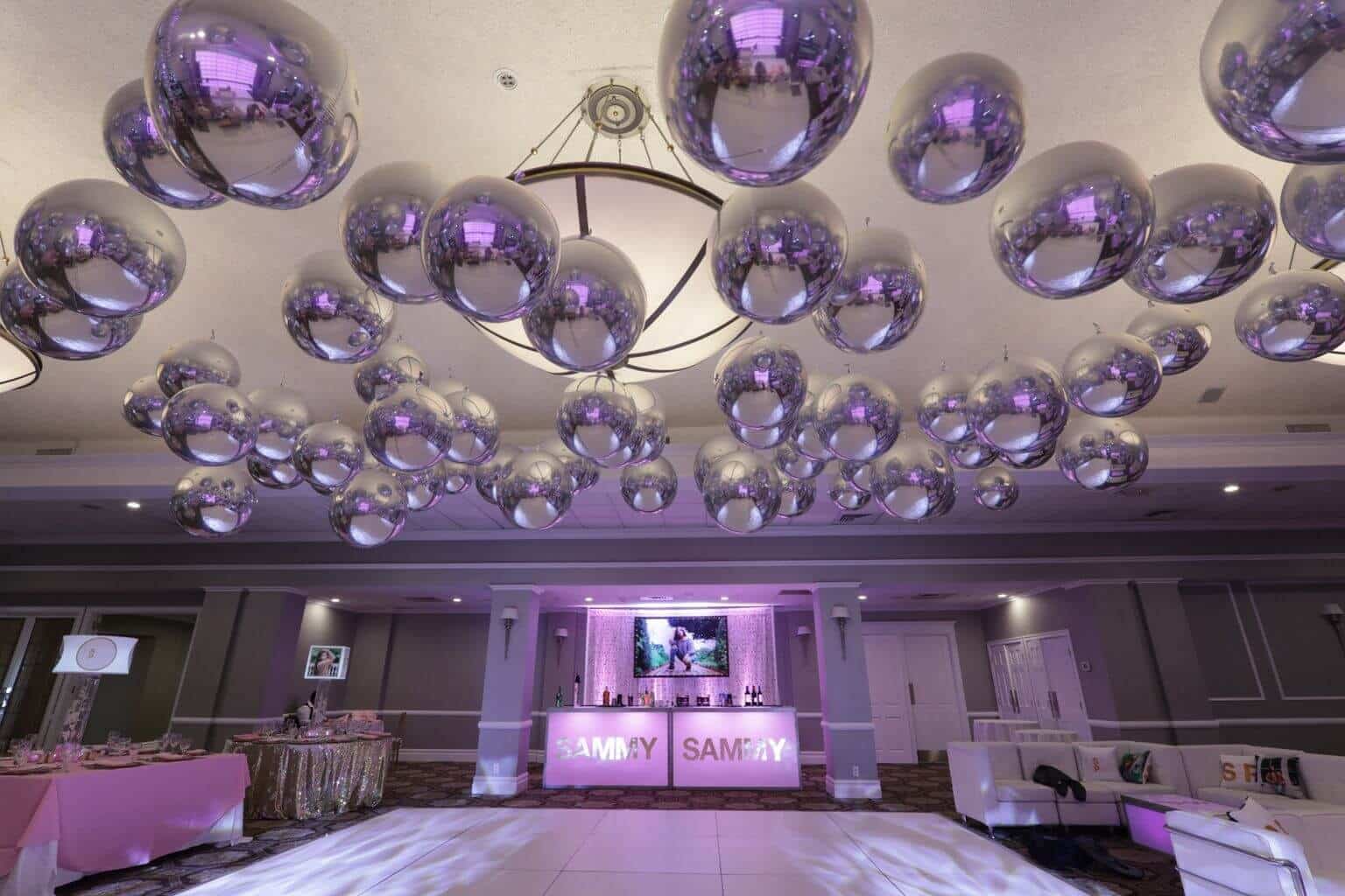 Silver Metallic Orbs Staggered over Dance Floor at Cedar Hill Country Club