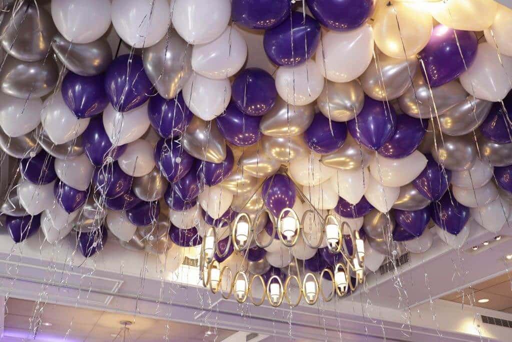 Purple and Silver Balloons on Ceiling over Dance Floor with Shimmer Ribbon