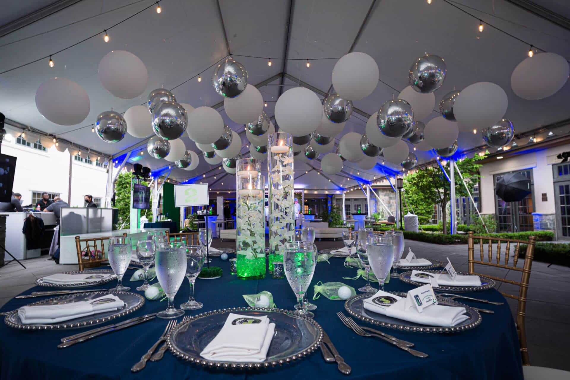 Large White Balloons and Silver Metallic Orbz over Dance Floor for Outdoor Bar Mitzvah