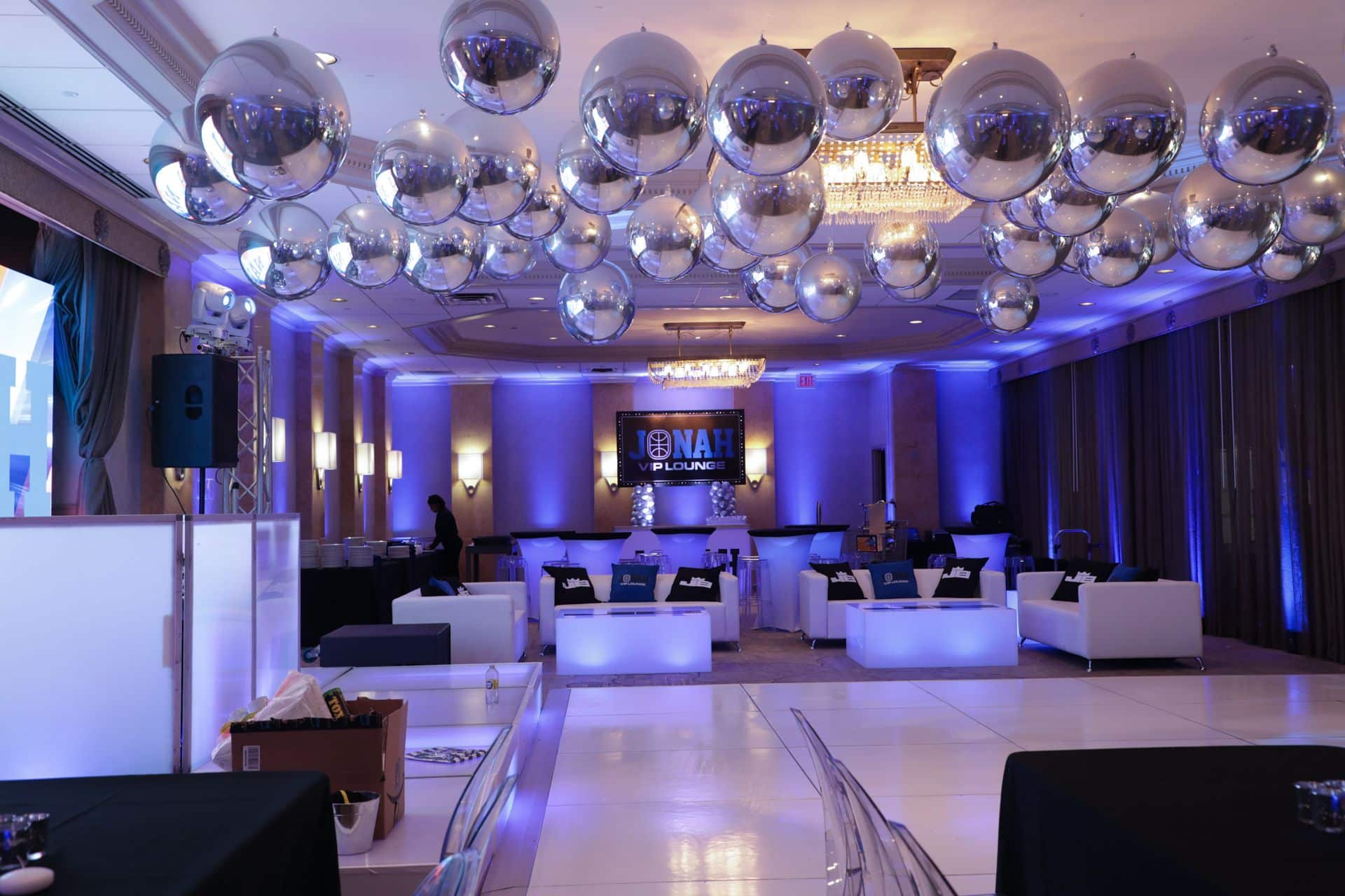 Silver Metallic Orbz Balloons over Dance Floor with Custom LED Lounge and Blue Uplighting at the Hilton, Woodcliff Lake